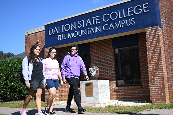 Students walking in front of Mountain Campus building