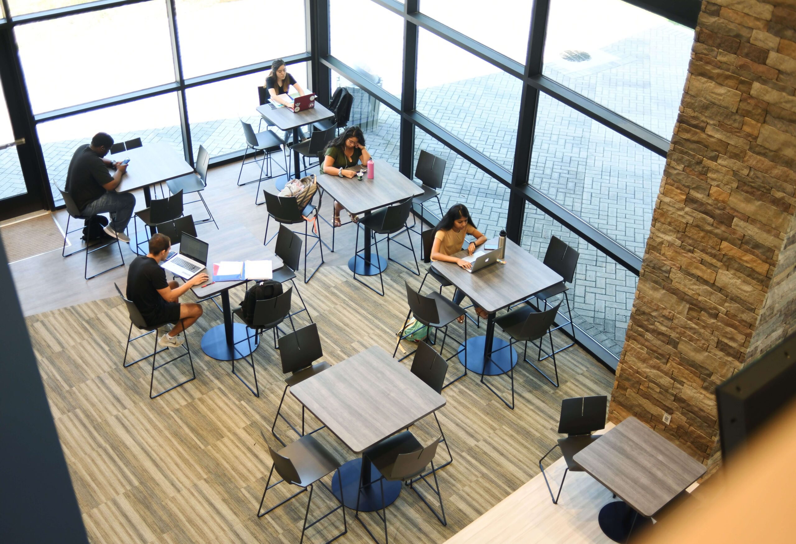 Aerial shot looking down at students working at tables