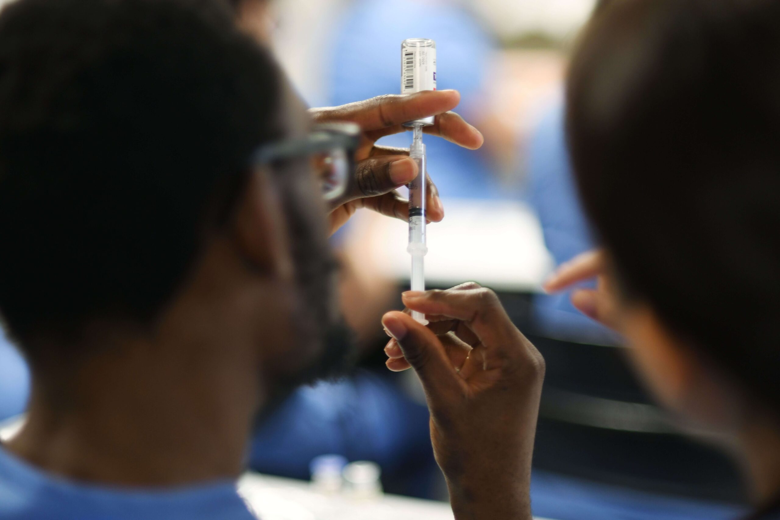 Student drawing a shot