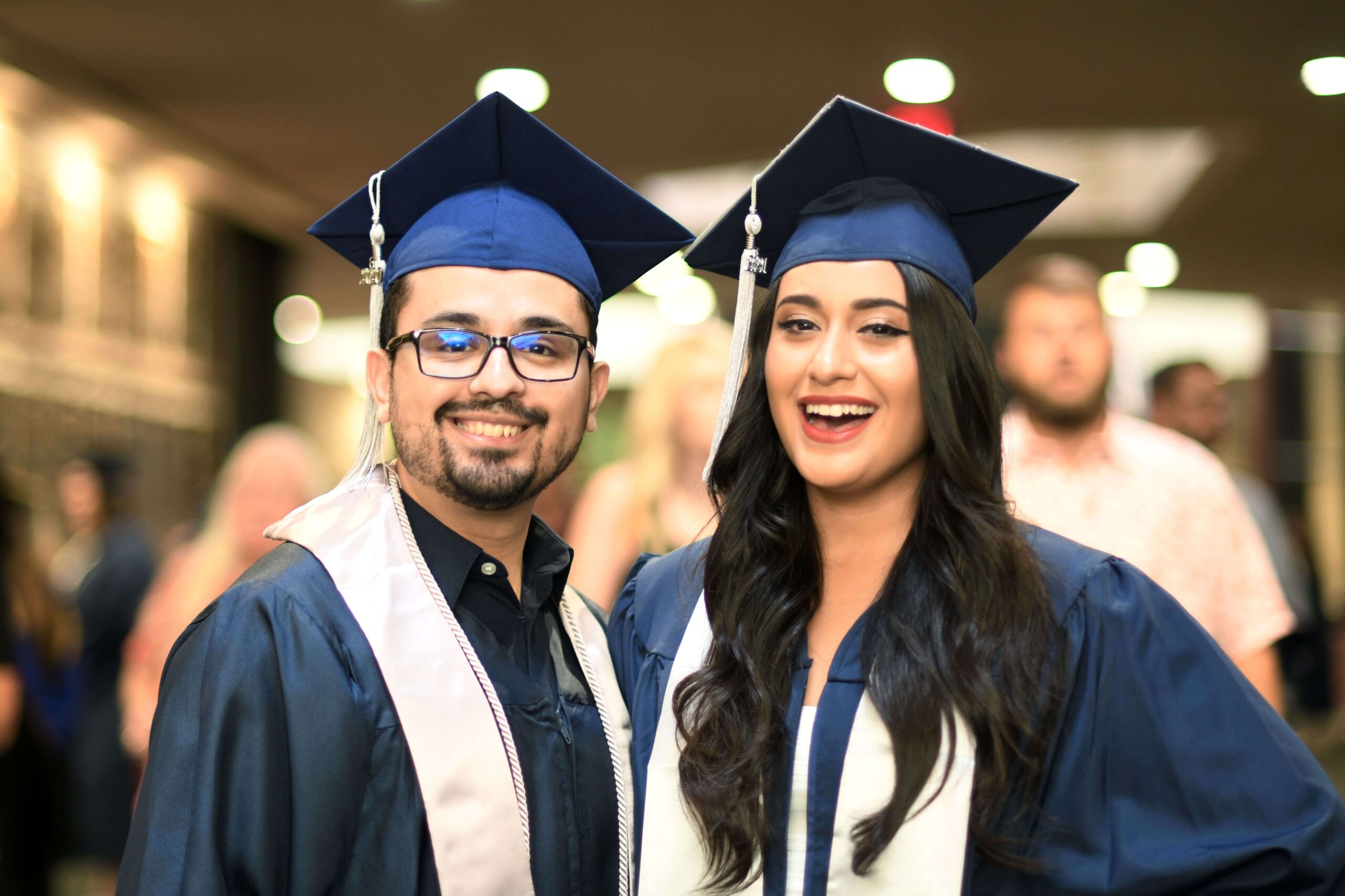 Graduating students, smiling
