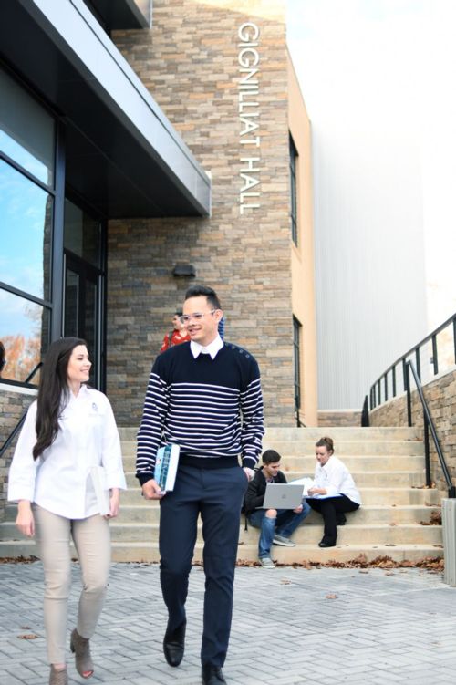 Students walking in front of Gignilliat Gall