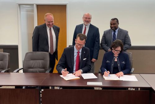 UWG and Dalton State representatives signing partnership agreement